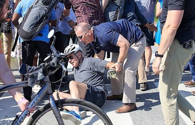 bidenfallsonbike.jpg