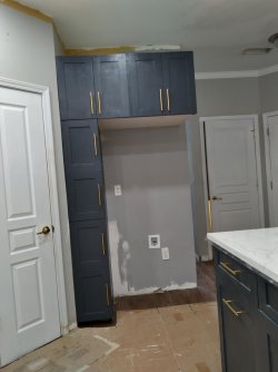 Pantry cabinet plus fridge topper..jpg