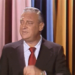 rodneydgrabbingathistie.GIF