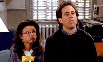 jerryelaineshruggif.gif