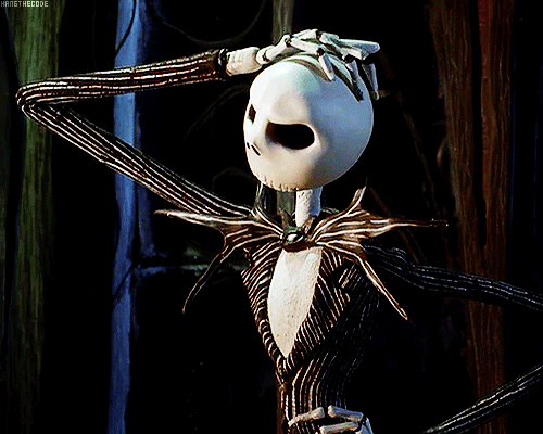 skeletontappingfingersonhead.gif